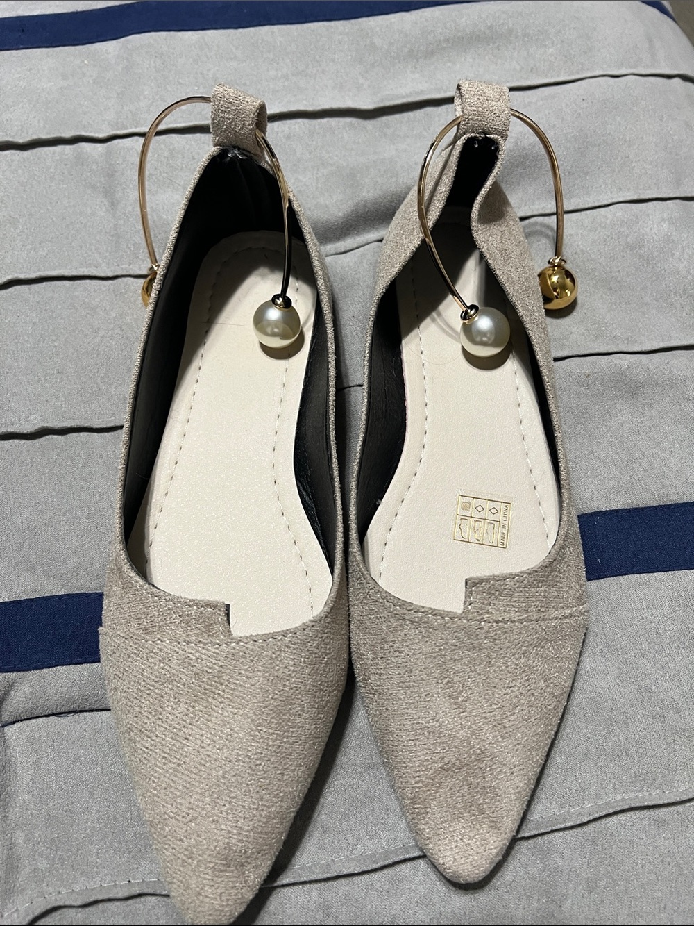 Khaki slip on ballet flats w/ metal ball ankle decor. Size 40, US equivalent 9.
